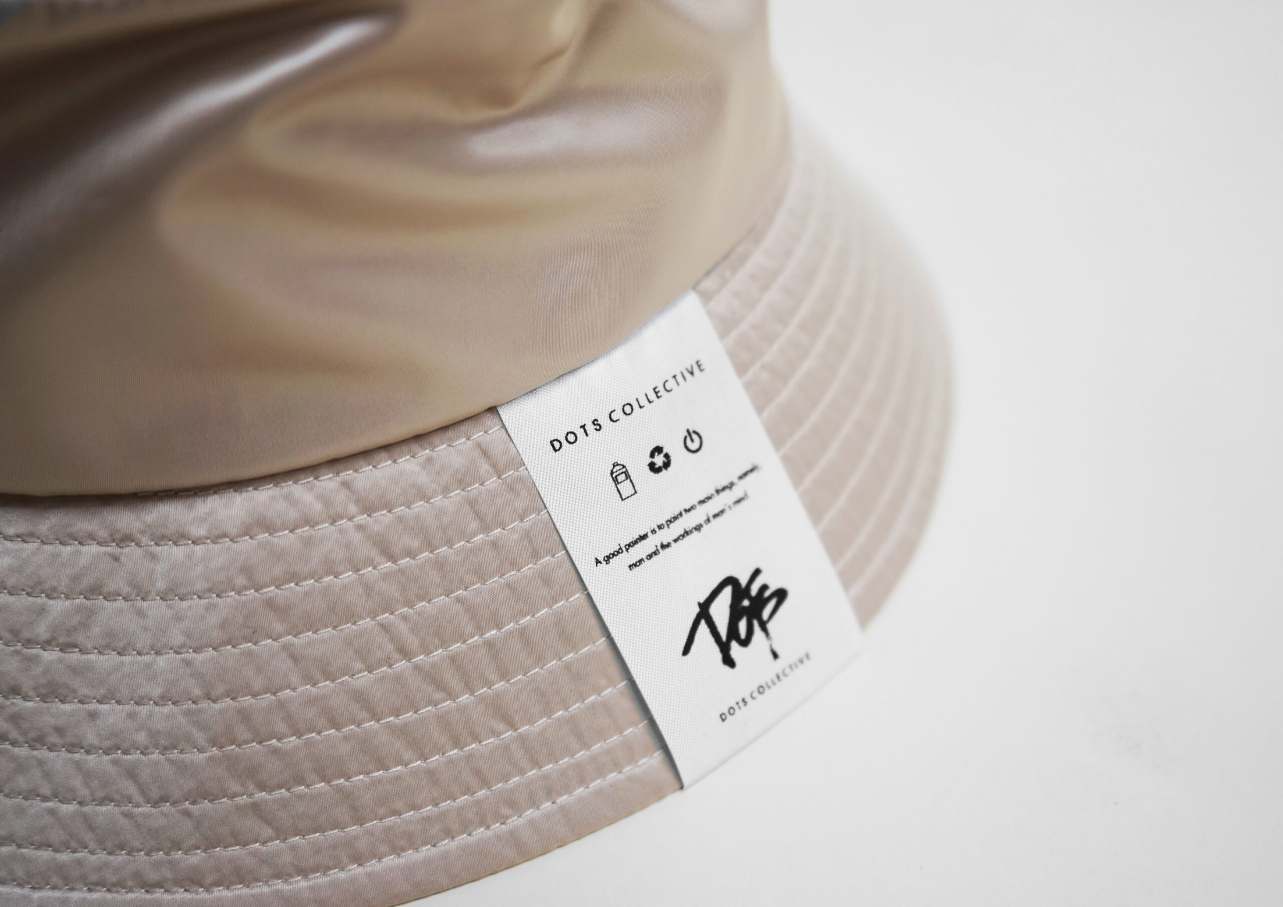 TAG BUCKET HAT | DOTS COLLECTIVE