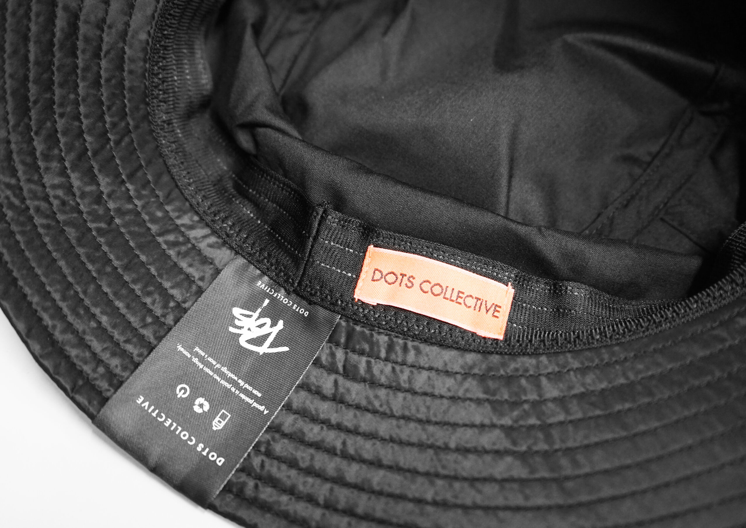 TAG BUCKET HAT | DOTS COLLECTIVE
